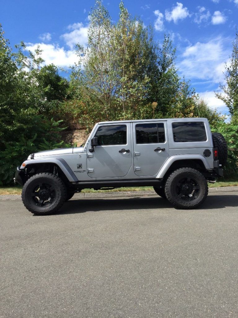 Very low miles 2015 Jeep Wrangler Altitude offroad
