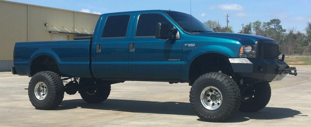 well modified 2000 Ford F 350 XLT pickup offroad
