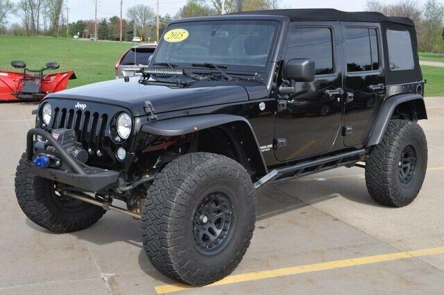 well modified 2015 Jeep Wrangler Sport offroad