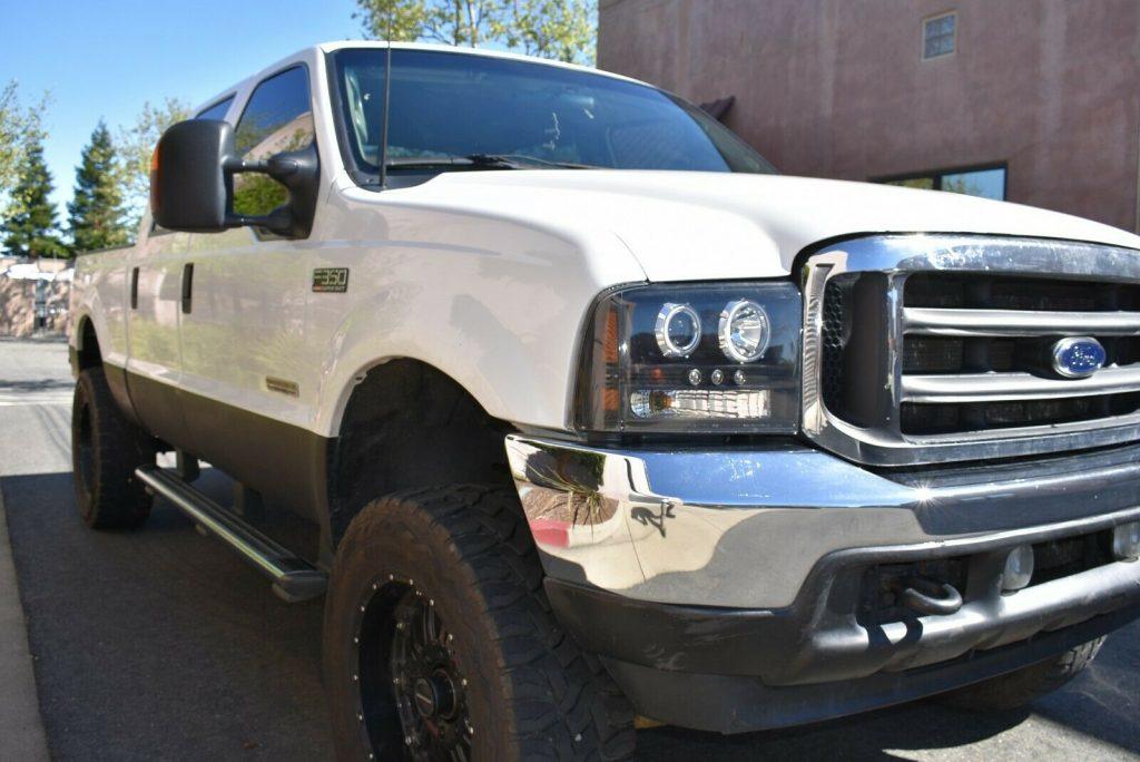 upgraded 2003 Ford F 350 Lariat pickup offroad